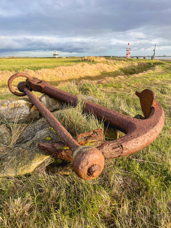 Old rusty anchor for the harbor in Hansweert, The Netherlands.の写真素材