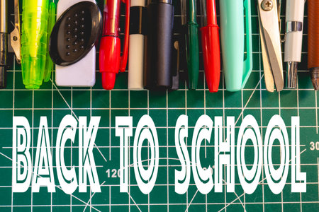 School supplies on a green background. Back To School background.の写真素材