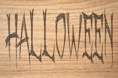 Creepy letters of Halloween, on a wooden background. Halloween background.の写真素材