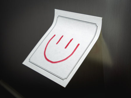 A positive message on a sticky note, Hanging on the fridge.