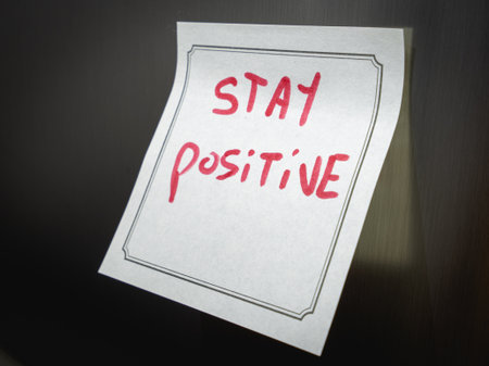 A positive message on a sticky note, Hanging on the fridge.の写真素材
