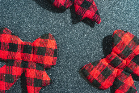 Christmas bow ties, on a gray background. Christmas background.