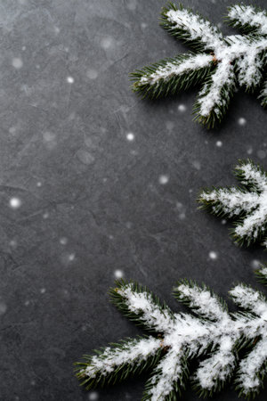 AI generated images. A structured dark gray background, with snowcovered pine tree branches. Background for Christmas.の素材