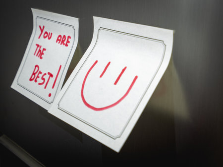 A positive message on a sticky note, Hanging on the fridge.の写真素材