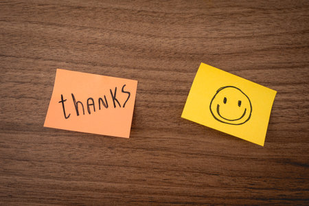 Thank you notes on a wooden background. Happy Thanksgiving Day.の写真素材