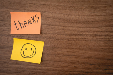 Thank you notes on a wooden background. Happy Thanksgiving Day.の写真素材