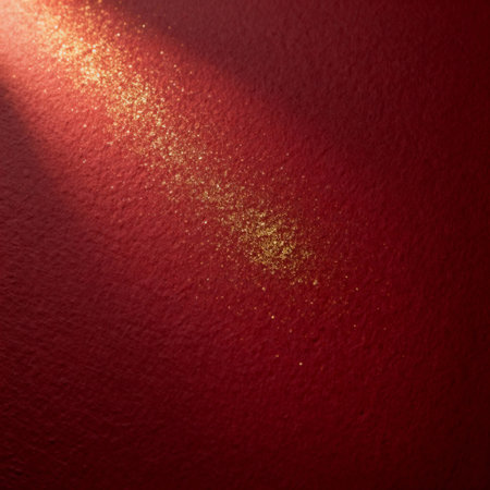 AI generated images. A structured dark red background, with golden glitter and light. Background for Christmas or New Year.の素材