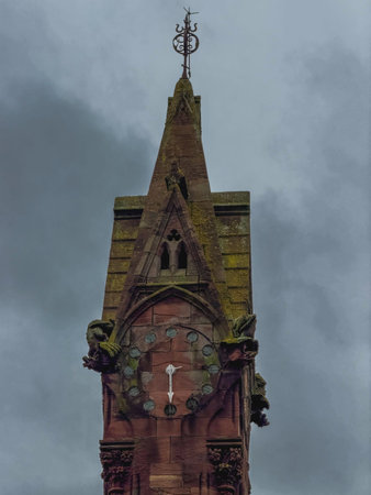 Old gates and building in front of a Cemetery in Liverpool, UK.
