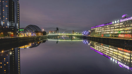 Februari 14, 2026. The BBC Scotland building with the lights on, at night. Glasgow, Scotland, UK.