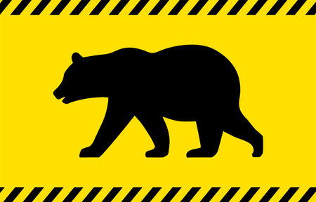 Yellow and black background illustration of bear danger, caution, warning, etc.のイラスト素材