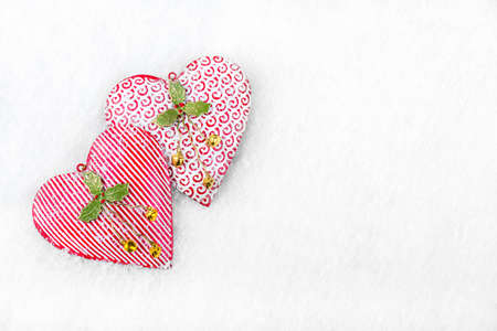 Christmas Background - Frozen hearts in the snowの写真素材