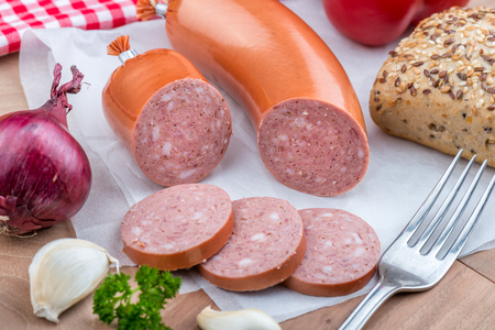 Tasty Quick Snack  Salami with garlic, onion, parsley and breadの写真素材