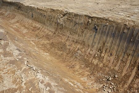 A channel for the drainage of the water that was dug with a bulldozer
