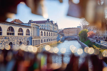 Ljubljanica river with old central market and Triple bridge, Ljubljana. View from Mesarski Most, springtime.の写真素材