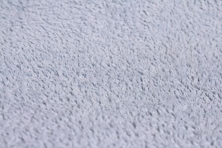 Closeup view of towel. Fluffy white backgroundの写真素材