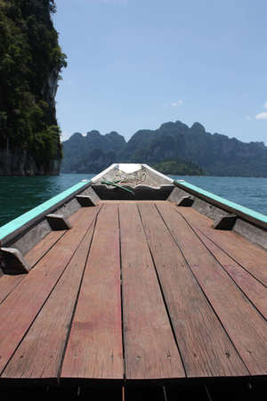 Travel with long-tailed baat in Rajjaprabha Dam,Thailandの写真素材
