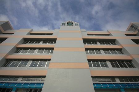 Nakorn Sri Thammarat,Thailand,July 5,2015:Green cross sign at top of the hospital building,Nakorn Sri Thammarat,Thailand.のeditorial素材