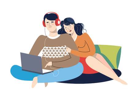 People on weekends watching films and series on laptopの写真素材