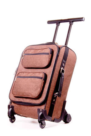 Brown business trolley bag for business travel. Studio shot, isolated on white background.の写真素材