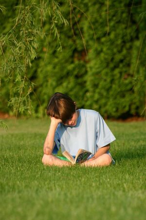 Boy Reading Bookの写真素材