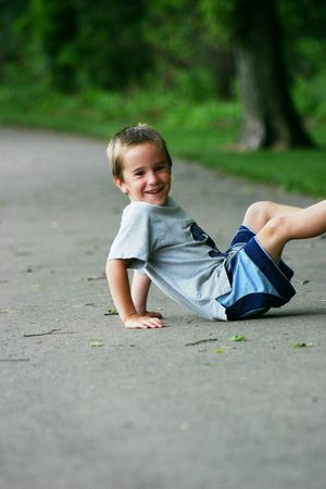 Boy on Sidewalkの写真素材