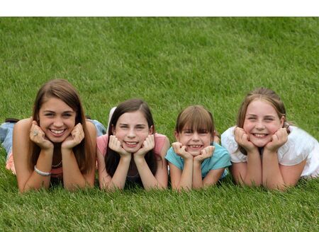 Girls Smiling with Chin in Handsの写真素材