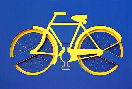 Yellow Bicycle on Royal Blue Backgroundの写真素材