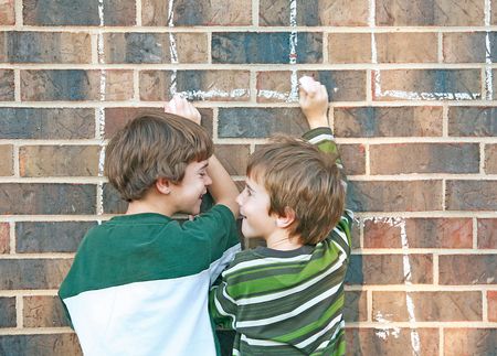 Boys Playing with Chalkの写真素材
