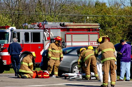 Fire fighters at work on the scene of accidentの写真素材
