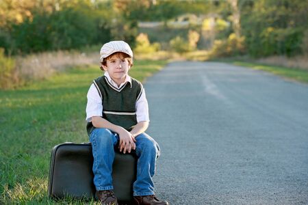 Boy Traveling Away From Homeの写真素材