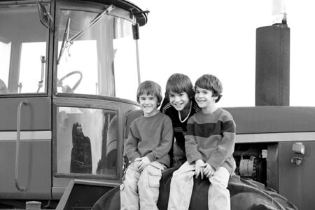 Three Boys on a Tractorの写真素材