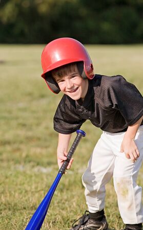 Boy Smiling Getting Ready to Hitの写真素材