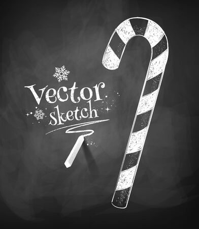 Chalkboard drawing of Christmas candy cane.のイラスト素材