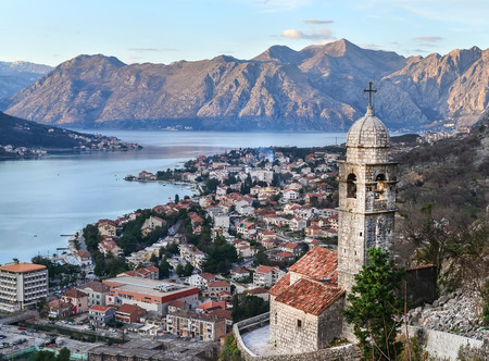 The view over Kotor, Montenegro, the old church, the bay and the mountains from the ancient fortress wallのeditorial素材