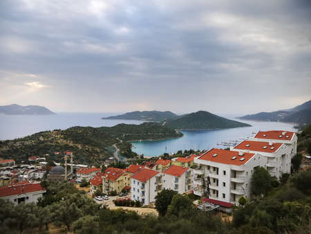 The view over the Cukurbag peninsula in Kas, Turkey and Kastelorizo island on a cloudy nasty day taken in November, 2013のeditorial素材