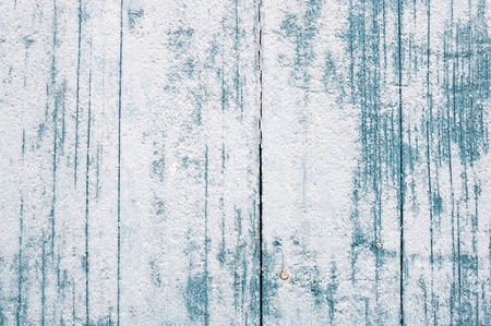 Grunge light blue painted wooden textured backgroundの写真素材