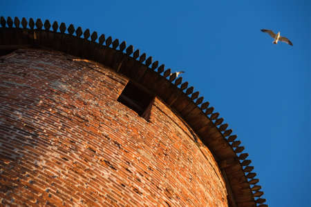 Anceint red brick Kremlin tower, view from the bottom, Nizhniy Novgorod,  Russiaの写真素材