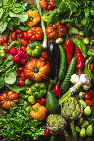 Fresh raw vegetable ingredients for healthy cooking or salad making, top view. Diet or vegetarian food conceptの写真素材