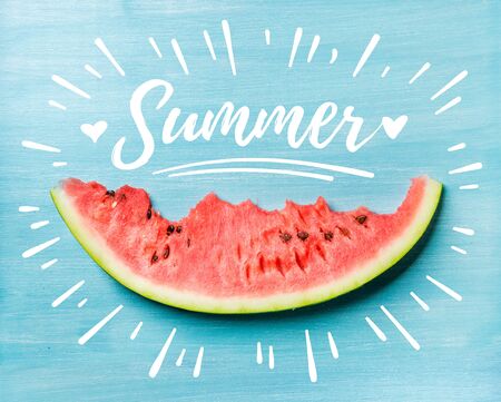 Summer concept illustration. Slice of watermelon on turquoise blue background, top view. White lettering inscriptionの写真素材