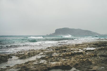 Stormy winter day at Mediterranean sea coast in Alanya, Mediterranean region, Turkey