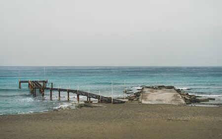 Empty sandy coast at Mediterranean sea in winter after storm in Alanya, Turkeyの写真素材