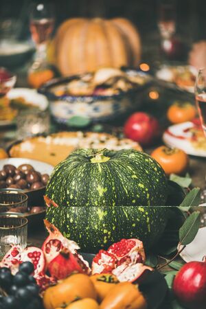 Traditional Christmas or New Year holiday celebration party. Festive Christmas table with different snacks, selective focus, vertical compositionの写真素材