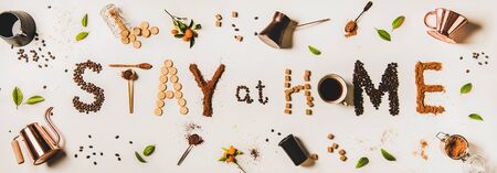 Stay at home lettering made from coffee kitchenware and dry food ingredients.の写真素材