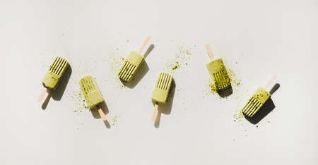 Green matcha coconut vegan ice cream with green tea powder.の写真素材