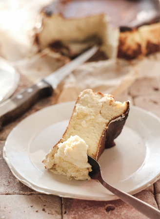 Piece of sweet Homemade San Sebastian burnt cheesecake