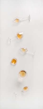 Trendy Orange or Amber wine in different glasses, vertical compositionの写真素材