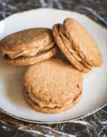 Homemade Peanut butter cookie dessert with nut creamの写真素材