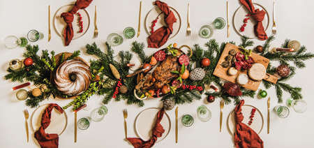 Flat-lay of Festive Christmas table setting over white backgroundの写真素材