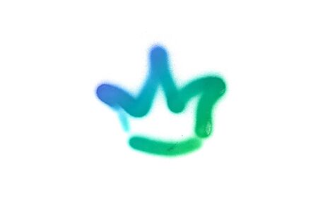 Graffiti crown sign sprayed on white isolated background. Corona symbol painted in street art tag style in trendy colorsの写真素材