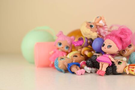 KHARKOV, UKRAINE - JANUARY 15, 2020: Many colorful plastic LOL dolls on table. LOL Surprise series toys manufactured by MGA Entertainment inc.のeditorial素材